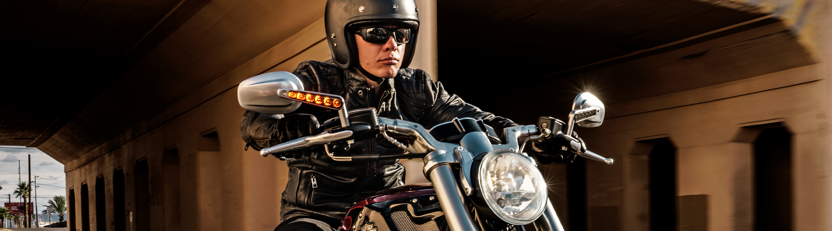 man wearing motorcycle sunglasses on motorcycle