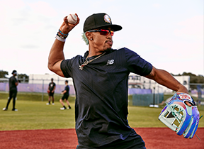 person playing baseball with sunglasses