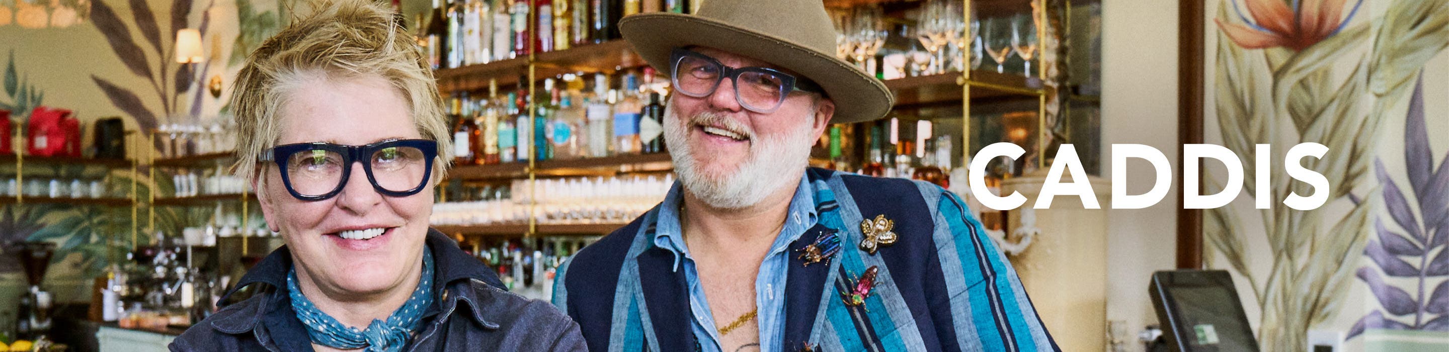 Man and woman wearing CADDIS glasses