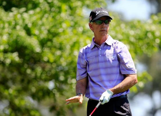 Larry Mize Wearing Oakley Half Jacket at 2014 Masters Tournament