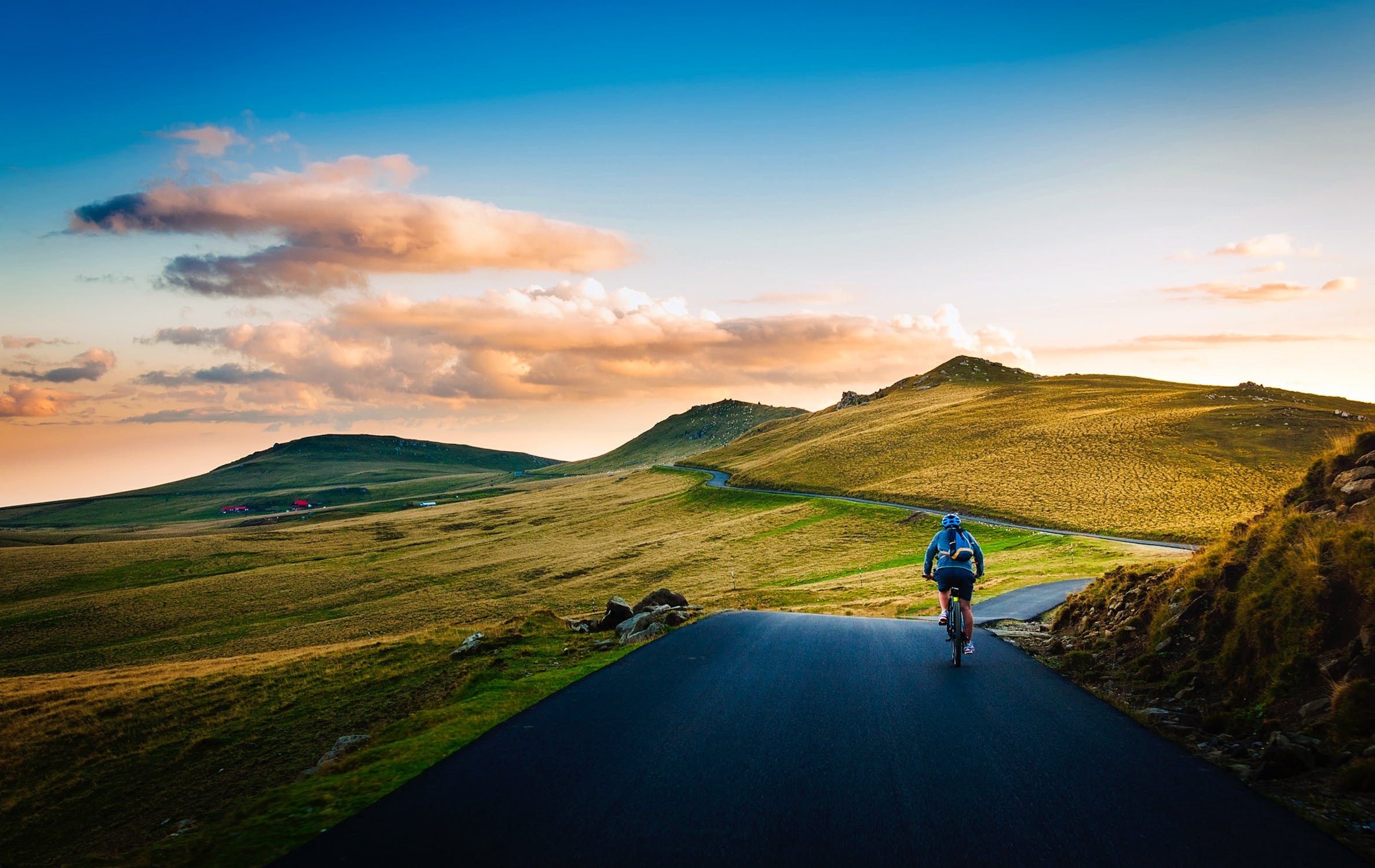 rear view of man on mountain road