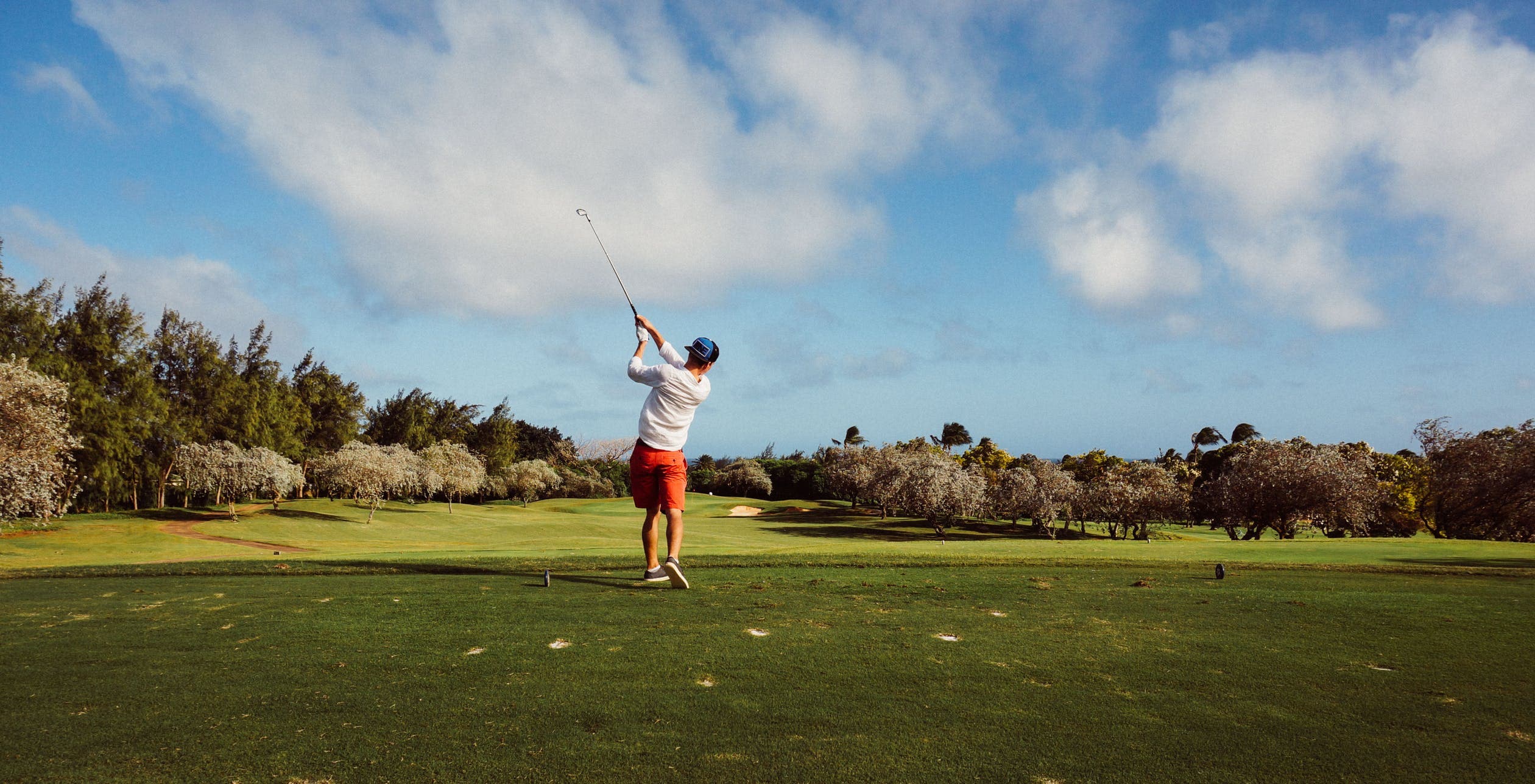 Outdoor Father's Day Activity Man Golfing On Golf Course