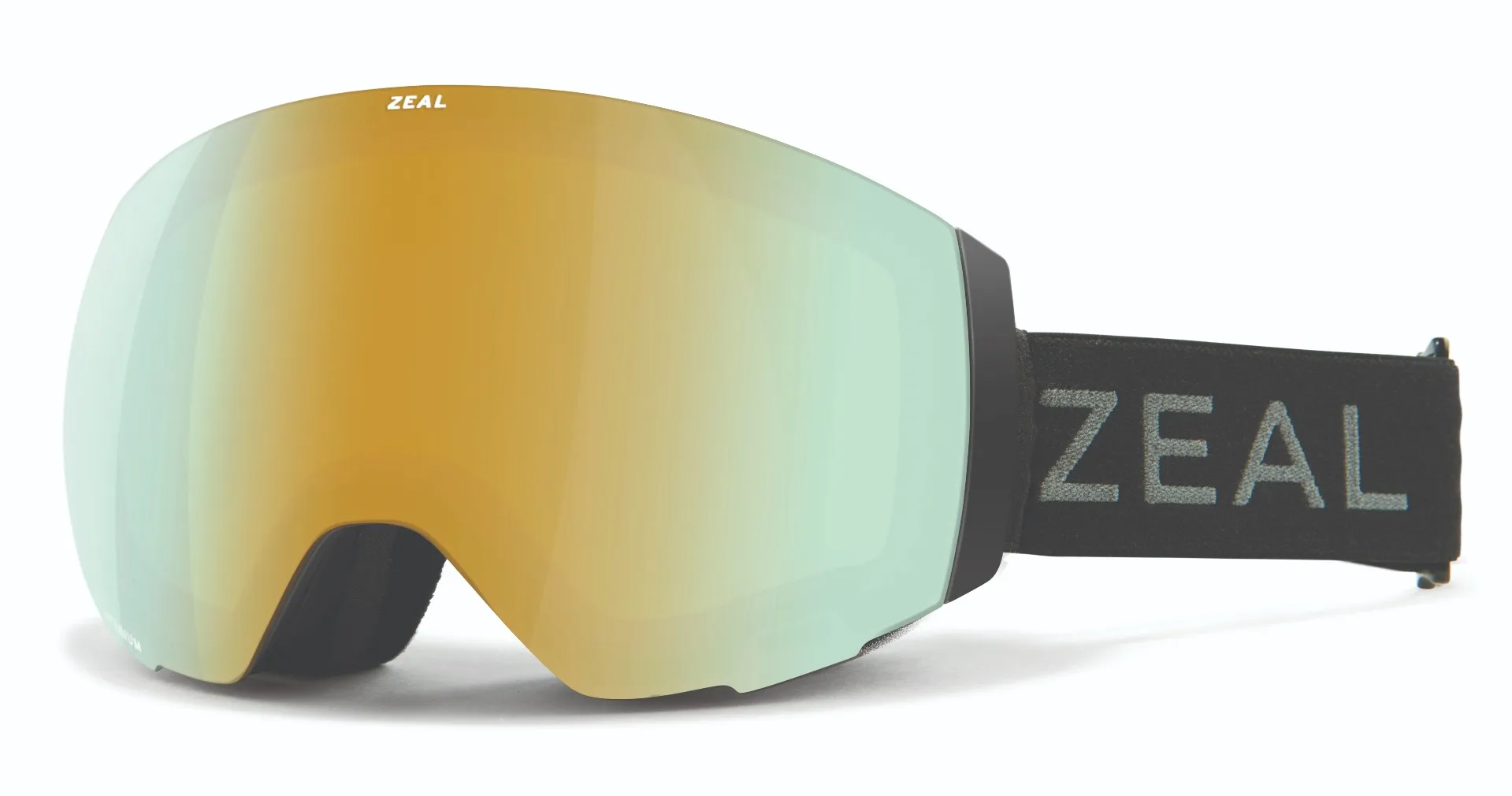 Zeal Portal in lineup of the best ski & snow goggles for small faces. Black strap with Zeal printed on it and a blue gold alchemy mirror shield lens.