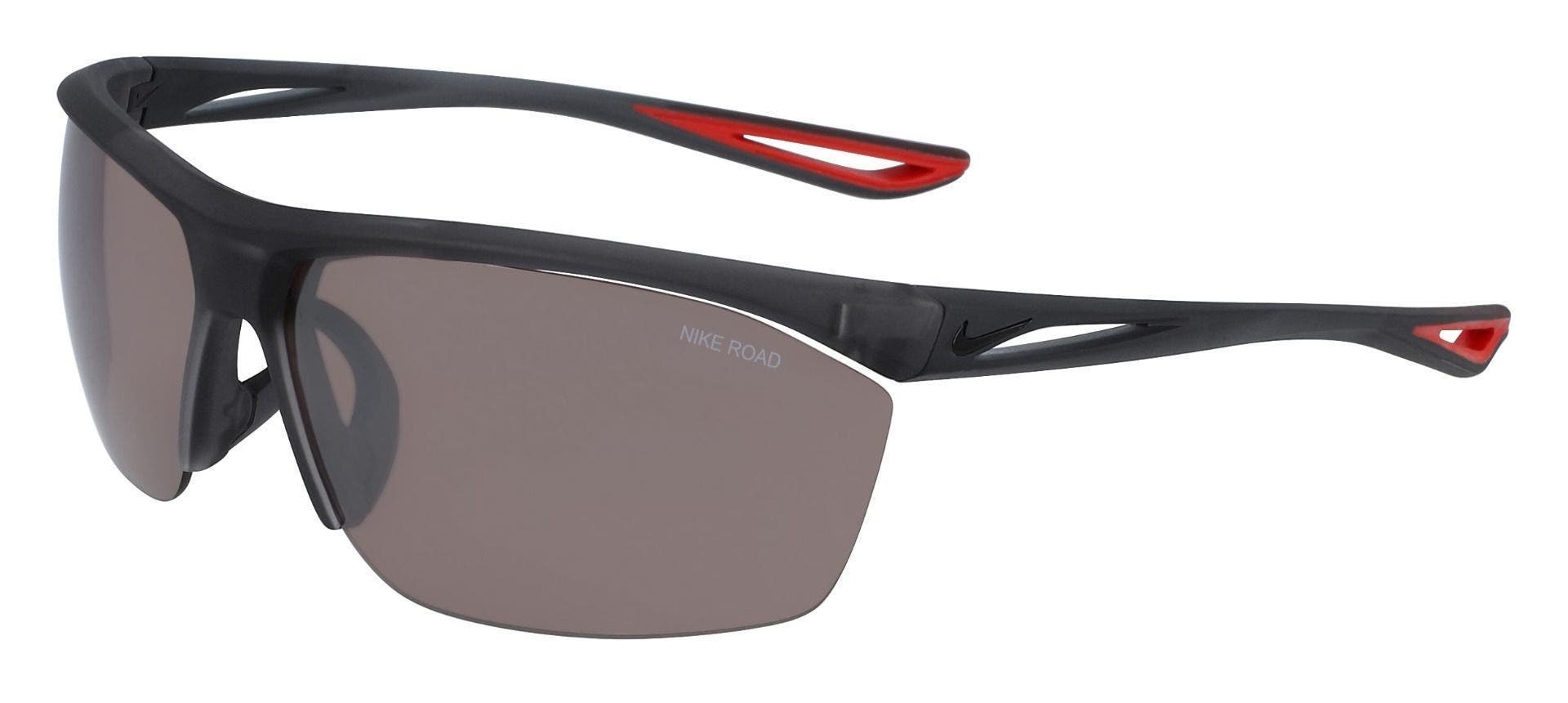 First frame in the Nike men's sunglasses size guide - the Tailwind S. A semi-rimless black frame with red temple tips and grey lenses.