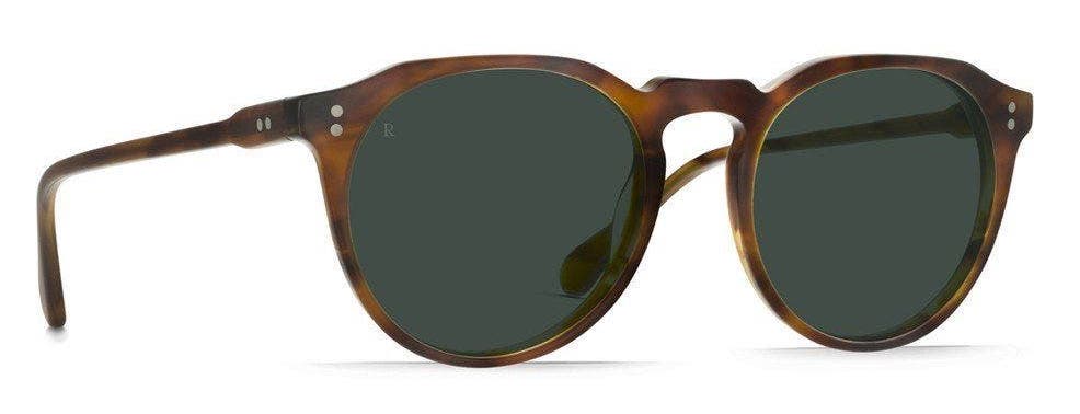 RAEN Remmy men's lifestyle sunglasses in brown with round green lenses.