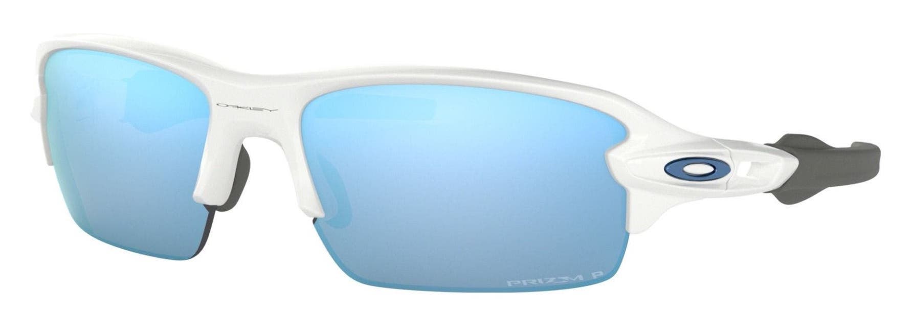 Oakley Flak XS junior polarized sunglasses in white with PRIZM™ polarized blue lenses.