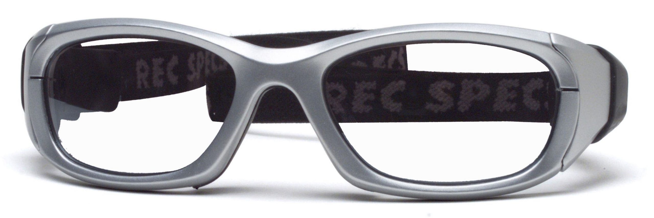 Safety-rated Rec Specs Maxx 31 sports goggles in silver with black elastic strap and clear lenses.
